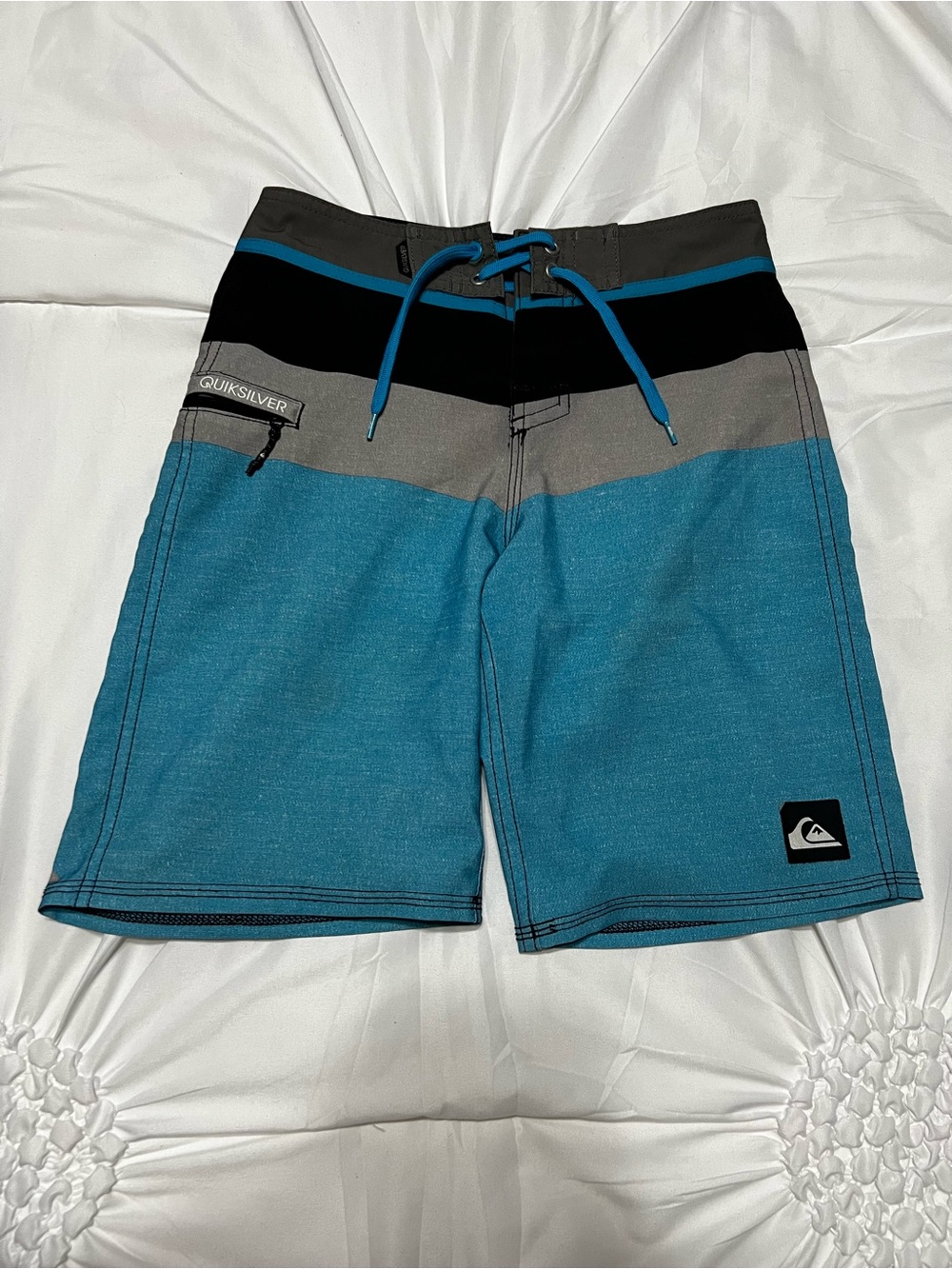Quiksilver Blue Striped Swim Board Shorts
• Size 24
• Excellent condition